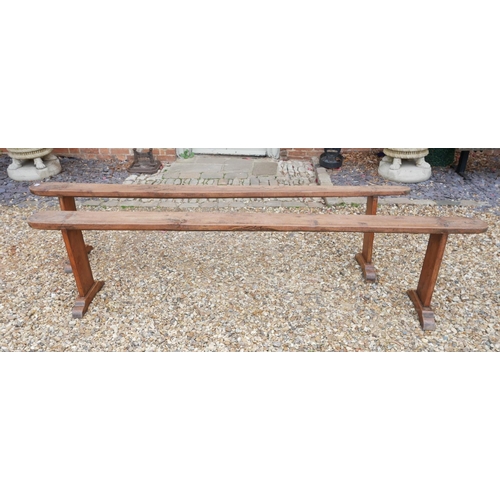 688 - A PAIR OF 19TH CENTURY FRENCH CHERRY WOOD BENCHES.
(220cm x 15.5cm x 54cm)

Condition: some age stai... 