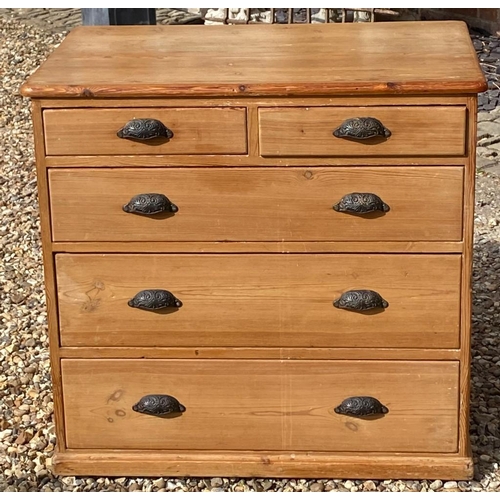 692 - A VICTORIAN WAXED PINE CHEST OF TWO SHORT ABOVE THREE LONG DRAWERS.