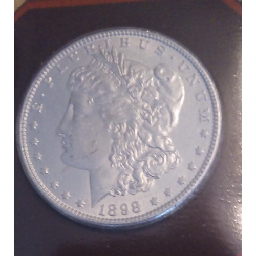 75 - A COLLECTION OF TWELVE AMERICAN UNCIRCULATED MORGAN SILVER DOLLARS OF THE 19TH CENTURY
Comprising 18... 
