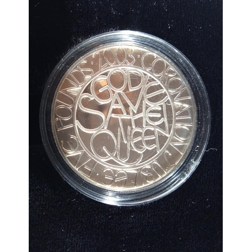 97 - A SILVER COMMEMORATIVE ONE CROWN AND TEN POUND BANKNOTE PROOF  SET, DATED 2003
In a protective capsu... 