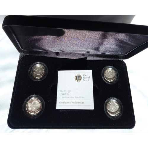 99 - A SILVER FOUR PIEDFORT ONE POUND COIN PROOF SET
Including Cardiff, Belfast, London and Edinburgh, in... 