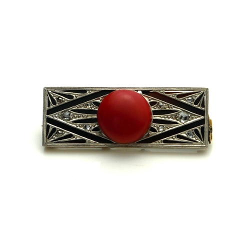 392 - AN ART DECO DESIGN YELLOW METAL, RED CORAL AND DIAMOND BROOCH
A circular coral disc edged with diamo... 