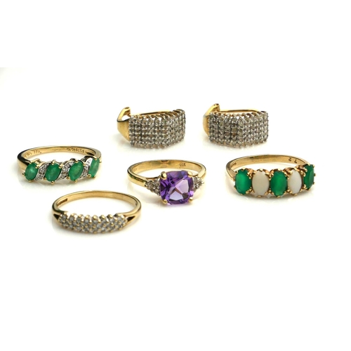 397 - A COLLECTION OF 9CT GOLD AND GEM SET JEWELLERY
To include a three stone emerald ring interspersed wi... 