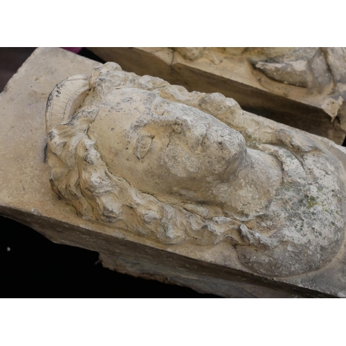 410 - A PAIR OF PORTLAND STONE CORBELS CARVED WITH MEDIEVAL FACIAL MASKS.
(17cm x 24cm x 31cm)

Condition:... 