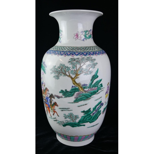 414 - A CHINESE FAMILLE ROSE DESIGN PORCELAIN VASE
Decorated with an Emperor with Royal carriage and horse... 