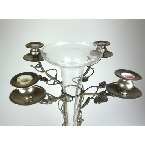 423 - A MID 20TH CENTURY CONTINENTAL SILVER PLATED FOUR LIGHT TABLE CANDELABRA
Applied with vine leaves, w... 