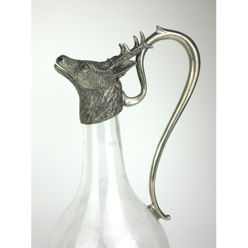 424 - AN EARLY 20TH CENTURY CONTINENTAL (POSSIBLY CENTRAL EUROPEAN) SILVER PLATED CLARET JUG
Having a clea... 