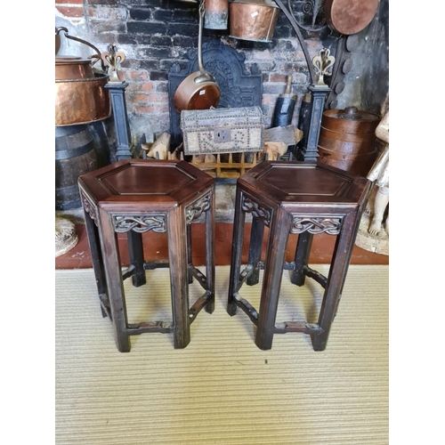 454 - A PAIR OF 19TH CENTURY CHINESE HARDWOOD HEXAGONAL OCCASIONAL TABLES
With pierced fretwork apron, rai... 