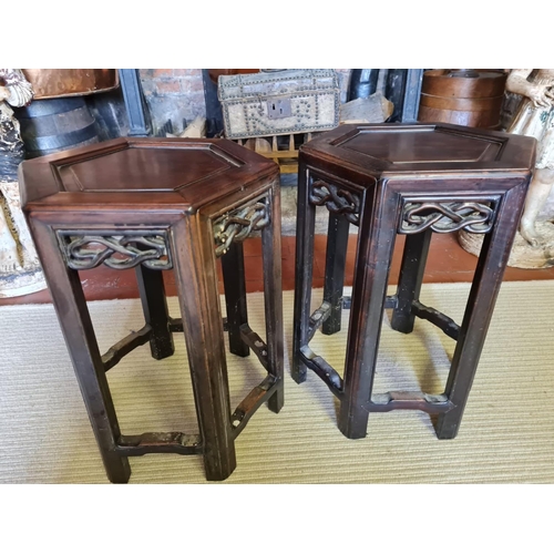 454 - A PAIR OF 19TH CENTURY CHINESE HARDWOOD HEXAGONAL OCCASIONAL TABLES
With pierced fretwork apron, rai... 