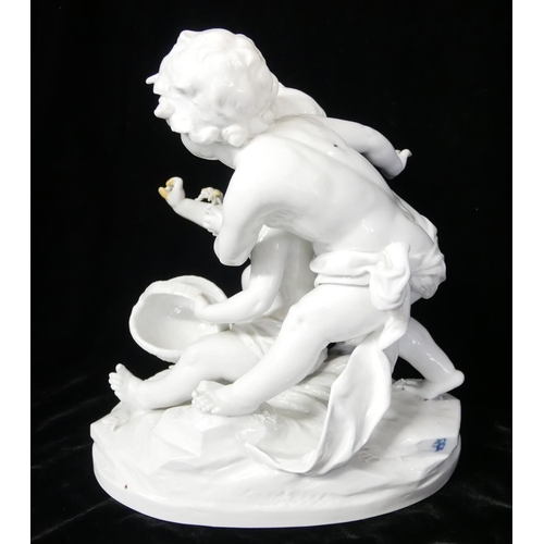 462 - A LARGE EARLY 20TH CENTURY ITALIAN WHITE GLAZE PORCELAIN FIGURAL GROUP
Two children at play with ins... 