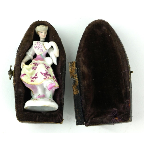 479 - A 19TH CENTURY CONTINENTAL PORCELAIN MINIATURE FIGURAL SCENT BOTTLE
Maiden wearing period attire, wi... 