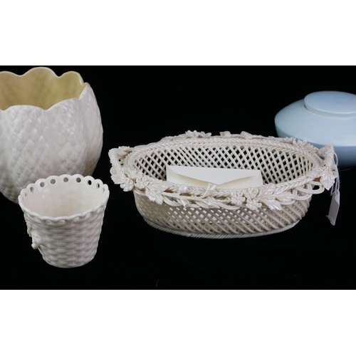 487 - BELLEEK, A COLLECTION OF THREE 20TH CENTURY IRISH PORCELAIN ITEMS
Comprising a basket with floral de... 