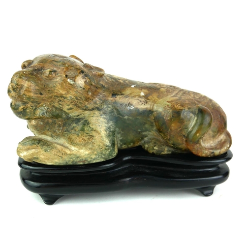 506 - AN ANTIQUE CHINESE  SOAPSTONE SCULPTURE OF A RECUMBENT LIONESS
Carved decoration of protruding front... 