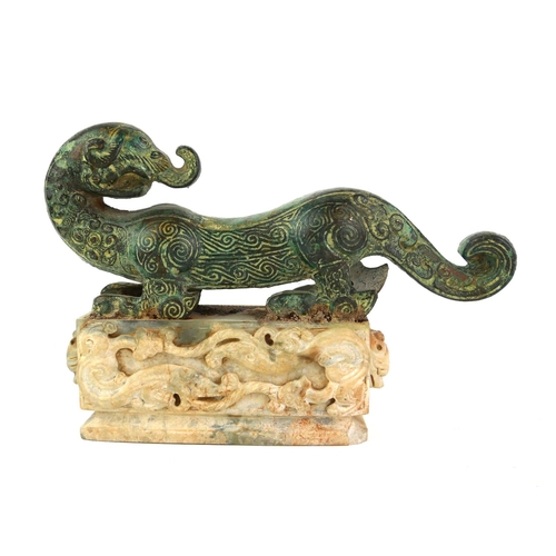 508 - A CHINESE ARCHAIC DESIGN BRONZE AND HARDSTONE SCULPTURE OF A DRAGON 
Engraved and raised decoration,... 