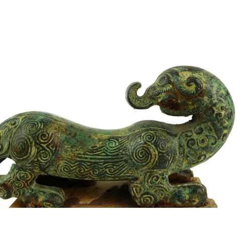 508 - A CHINESE ARCHAIC DESIGN BRONZE AND HARDSTONE SCULPTURE OF A DRAGON 
Engraved and raised decoration,... 