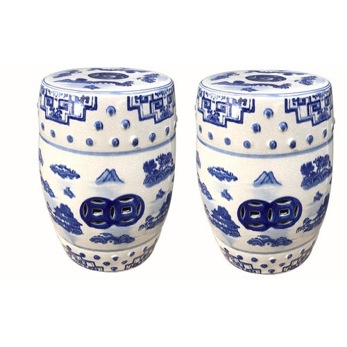 513 - A PAIR OF CHINESE PORCELAIN BLUE AND WHITE GARDEN SEATS
Each decorated with Oriental view and pierce... 