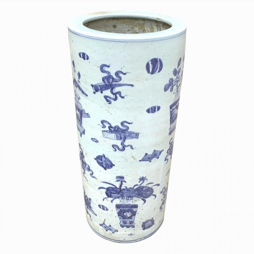 515 - A LARGE ORIENTAL BLUE AND WHITE STICK CYLINDRICAL STAND
Foliage decoration. 
(h 60cm)