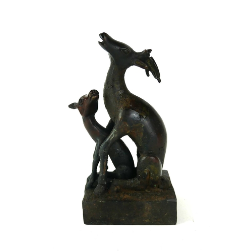 526 - A CHINESE BRONZE 'DOUBLE DEER' SEAL
Female deer with detachable fawn, both pieces having archaic for... 