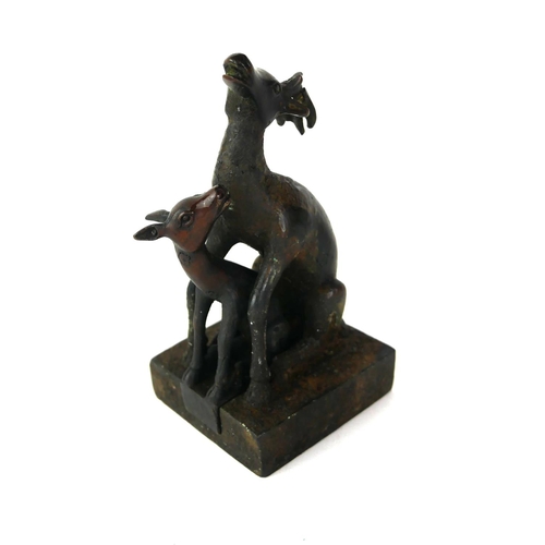 526 - A CHINESE BRONZE 'DOUBLE DEER' SEAL
Female deer with detachable fawn, both pieces having archaic for... 