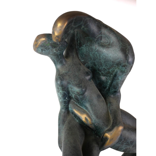 529 - AFTER HENRY MOORE, A MODERN BRONZE GROUP OF LOVERS 
Raised on a rectangular base.
(47cm)