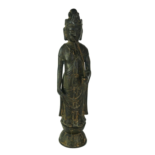 531 - A BRONZE STATUE OF GUANYIN AND FLOWER
Standing pose wearing long robes, on a double lotus base. 
(ap... 