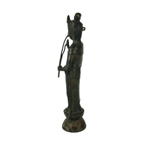 531 - A BRONZE STATUE OF GUANYIN AND FLOWER
Standing pose wearing long robes, on a double lotus base. 
(ap... 