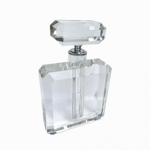 554 - A LARGE HEAVY ART DECO STYLE CUT GLASS SCENT BOTTLE AND STOPPER
In Odeon style.
(16cm x 26cm)

Condi... 