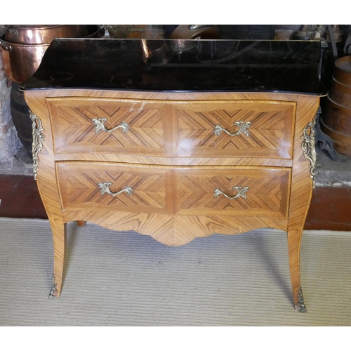 702 - A FRENCH KINGWOOD BOMBE CHEST OF TWO DRAWERS 
With later peach glass mirrored top.
(91cm x 50cm x 70... 