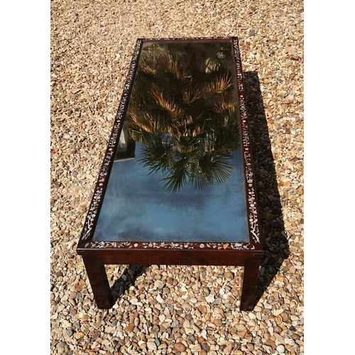 716 - AN EARLY/MID 20TH CENTURY CHINESE TEA TABLE
With central mirrored surface enclosed by mother of pear... 