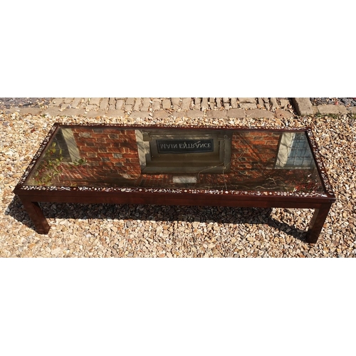 717 - AN EARLY/MID 20TH CENTURY CHINESE TEA TABLE
With central planished mirrored surface enclosed by a mo... 