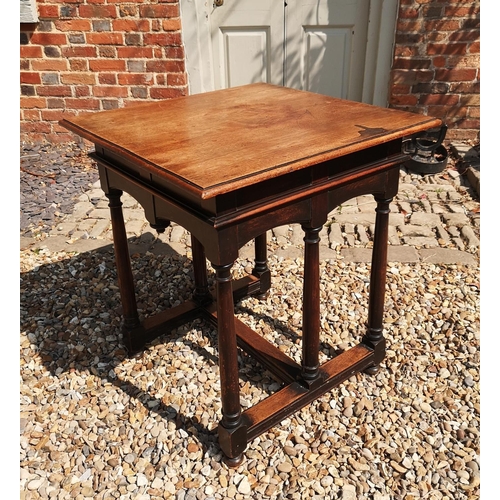 718 - LIBERTY & CO. LTD, LONDON, A MAHOGANY CENTRE TABLE
The square top above a shaped apron, raised on si... 