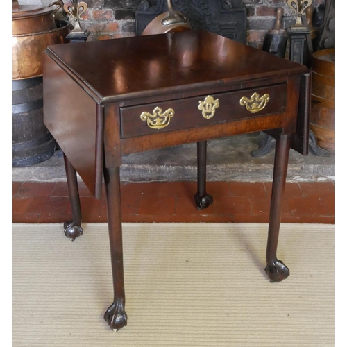 726 - AN 18TH CENTURY CUBAN MAHOGANY DROP LEAF SIDE TABLE
The single drawer fitted with brass handles and ... 