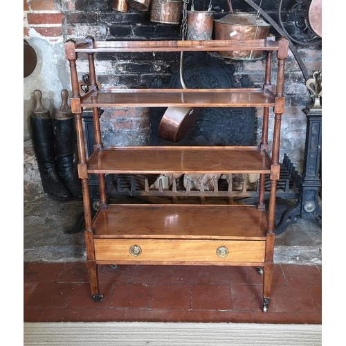 732 - A 19TH CENTURY SATINWOOD FLOORSTANDING OPEN BOOKCASE
With graduating shelves and lower drawer, stand... 