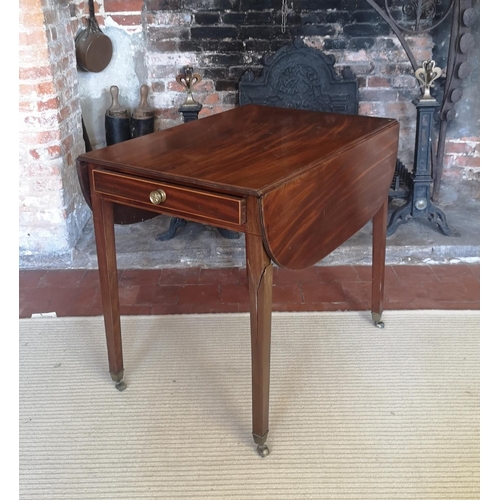 734 - A GEORGIAN MAHOGANY PEMBROKE TABLE
With real and false drawer, raised on square tapering legs with b... 