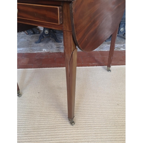 734 - A GEORGIAN MAHOGANY PEMBROKE TABLE
With real and false drawer, raised on square tapering legs with b... 