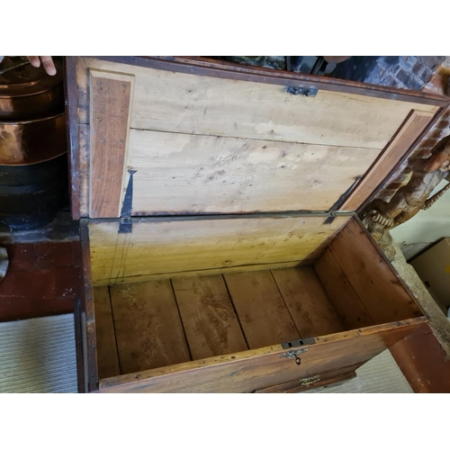 742 - AN 18TH CENTURY OAK MULE CHEST
The rise and fall top above two drawers, fitted with brass escutcheon... 