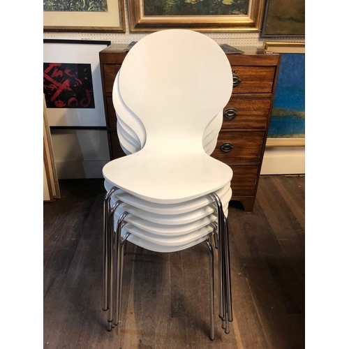 750 - IN THE STYLE OF FRITZ HANSEN, A SET OF SIX CREAM PLYWOOD CHAIRS.

Condition: some very light marks