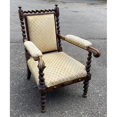 759 - A LATE VICTORIAN MAHOGANY OPEN ARMCHAIR
With barley twist supports, upholstered back seat arms, alon... 