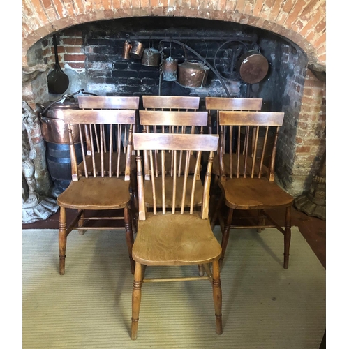 760 - A SET OF SEVEN LATE 19TH CENTURY ASH AND ELM STICK BACK CHAIRS
Having solid seats, on turned legs jo... 