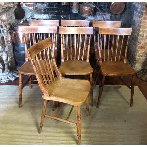 760 - A SET OF SEVEN LATE 19TH CENTURY ASH AND ELM STICK BACK CHAIRS
Having solid seats, on turned legs jo... 