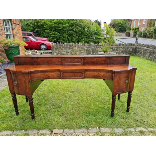 763 - A LARGE 18TH CENTURY MAHOGANY SIDEBOARD
With a stepped gallery shelf above two inverted drawers flan... 