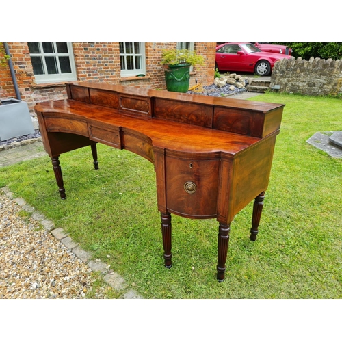 763 - A LARGE 18TH CENTURY MAHOGANY SIDEBOARD
With a stepped gallery shelf above two inverted drawers flan... 