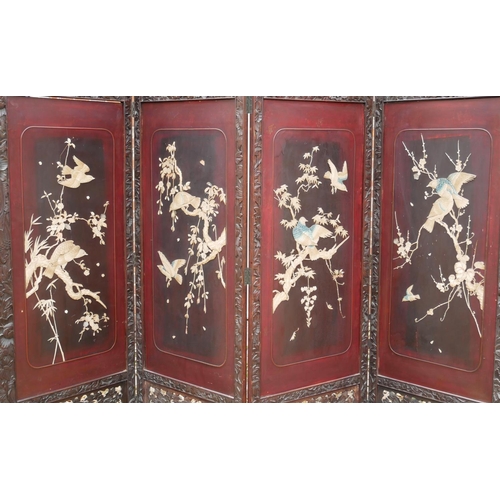 764 - A 19TH CENTURY JAPANESE SHIBAYAMA AND LACQUERED FOUR FOLD SCREEN
The pierced carved upper and lower ... 