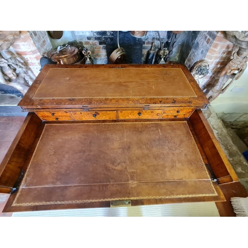 767 - AN 18TH CENTURY DUTCH WALNUT AND FLORAL MARQUETRY INLAID SIDE/WRITING TABLE
The rectangular top open... 