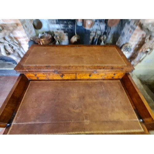 767 - AN 18TH CENTURY DUTCH WALNUT AND FLORAL MARQUETRY INLAID SIDE/WRITING TABLE
The rectangular top open... 