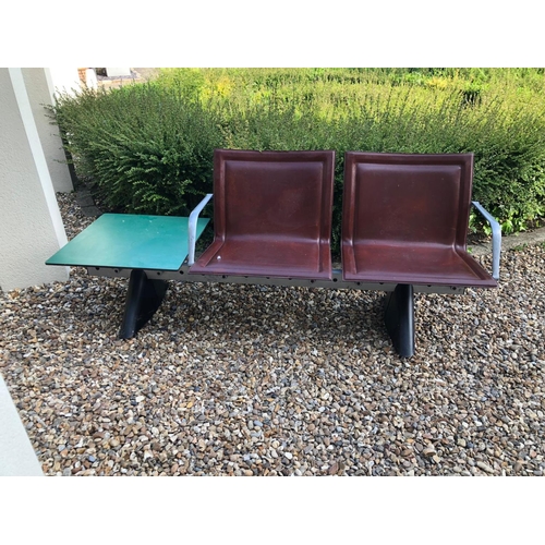 771 - AN ITALIAN  STEEL, ALUMINIUM AND LEATHER TWO SEATER BENCH
Brown leather covers with aluminium armres... 