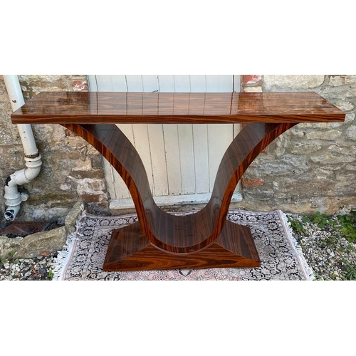 780 - A STYLISH ART DECO DESIGN LACQUERED WALNUT HALL/CONSOLE TABLE
The rectangular top with raised ‘V’ se... 