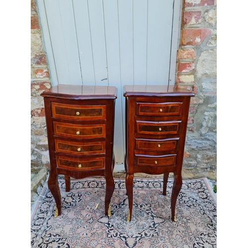 787 - A PAIR OF CONTINENTAL LACQUERED WALNUT BOW FRONTED PEDESTAL CHESTS
With four drawers, on cabriole le... 