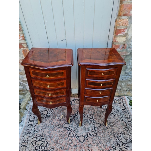 787 - A PAIR OF CONTINENTAL LACQUERED WALNUT BOW FRONTED PEDESTAL CHESTS
With four drawers, on cabriole le... 