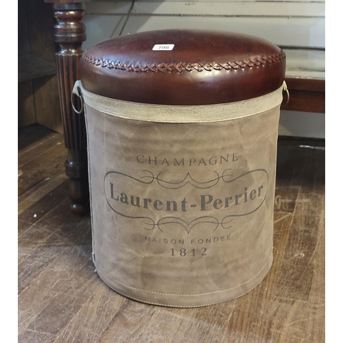 796 - A LAURENT-PERRIER CHAMPAGNE OXBLOOD LEATHER AND SUEDE UPHOLSTERED CIRCULAR STOOL.
(diameter 38cm x h... 